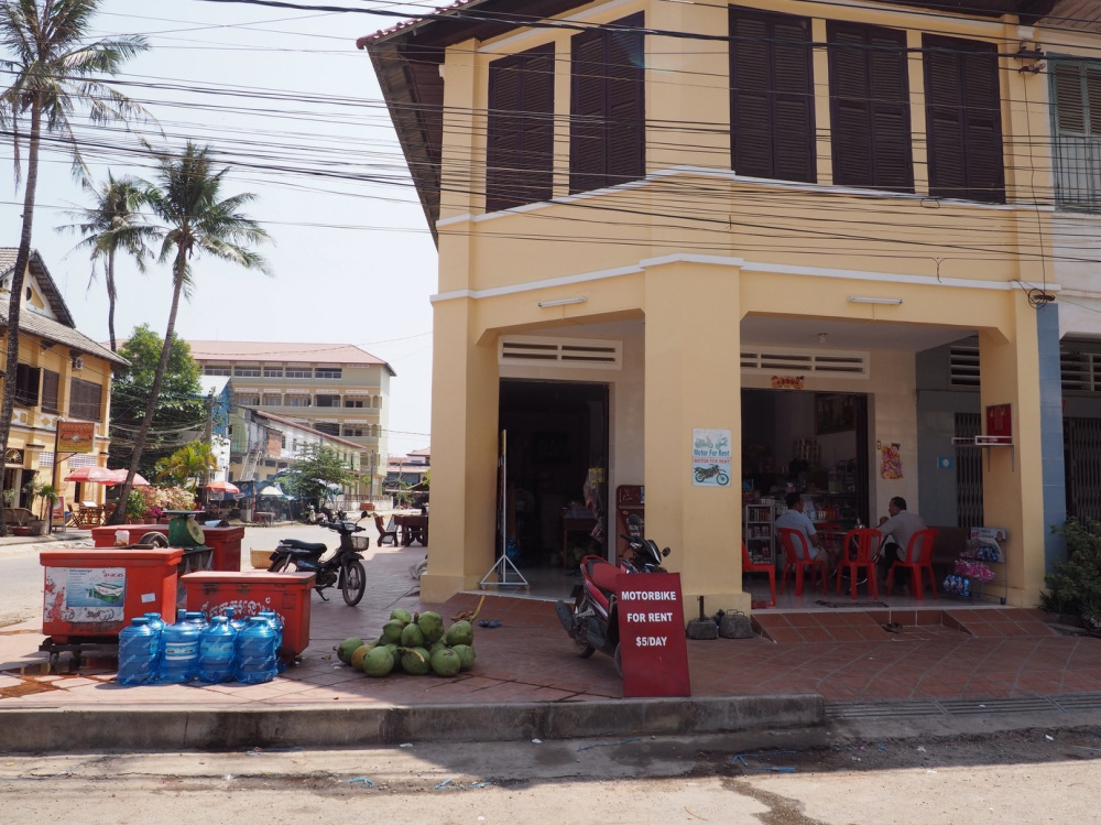 A convenience store, motorbike rental and housing mix