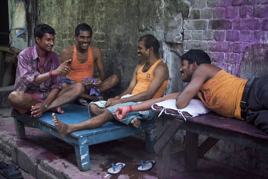 Friends in conversation after Holi, Calcutta Kolkata India